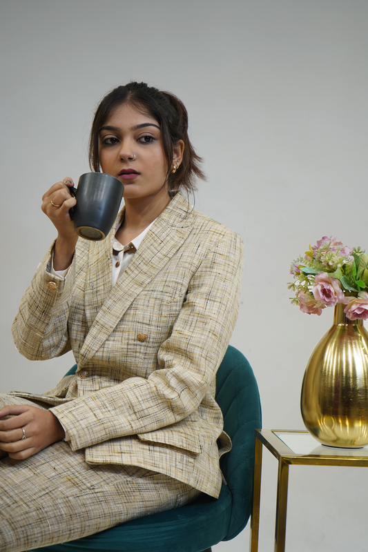 Cream self textured linen based 2 piece double  breasted blazer trouser set.