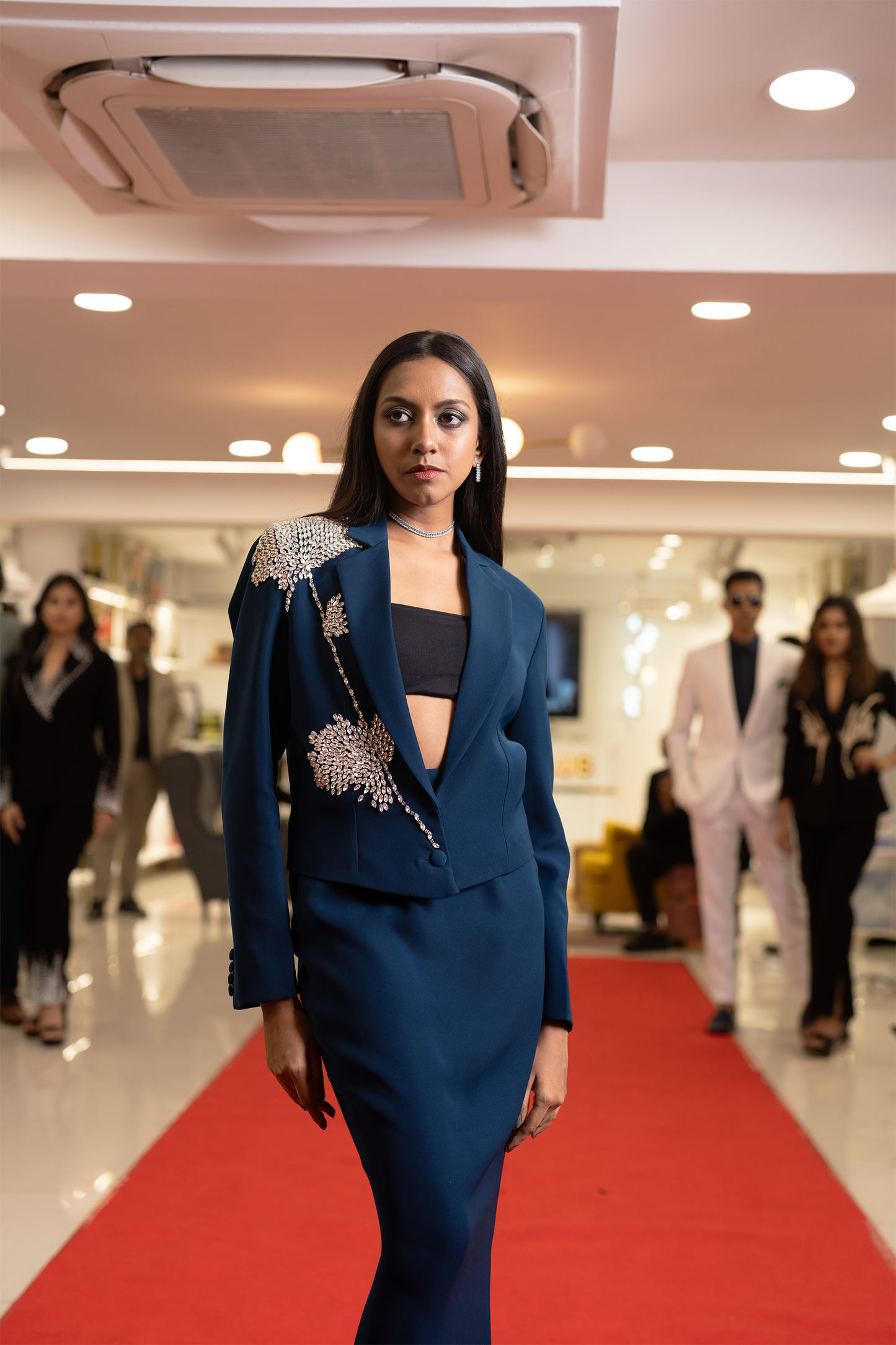 Italian teal blue wool crepe designer glass stone work embroidered blazer and long body on skirt set.